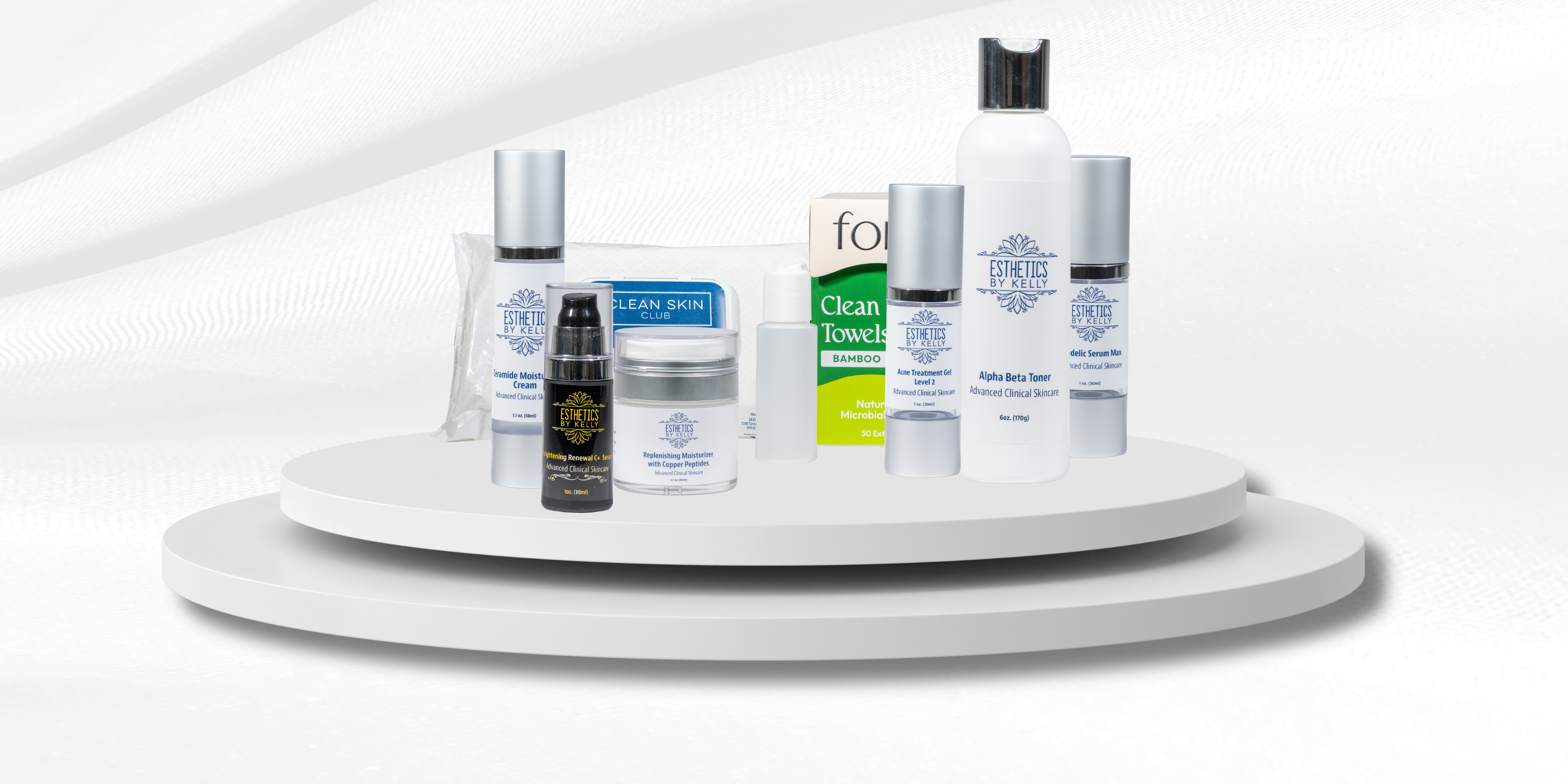 Assorted skincare products for acne and anti-aging on white display stands